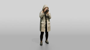 White Woman in Poncho Taking a Photo - 3D character model, view 1
