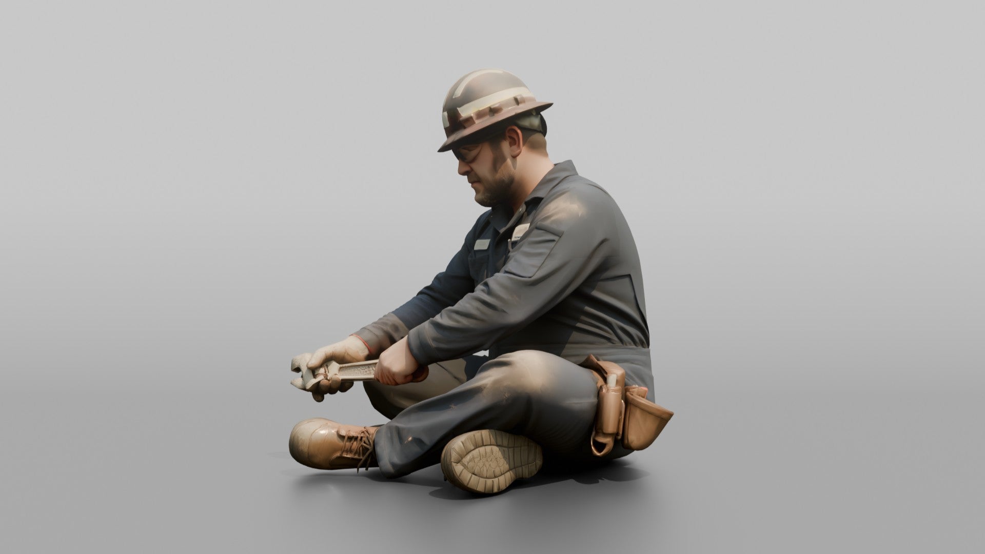 Engineer Tightening a Bolt on a Pipe Fitting