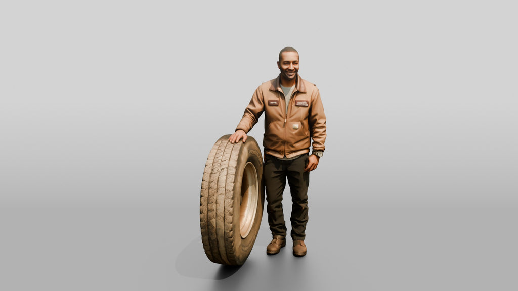 Mechanic Resting Hand on a Truck Tire