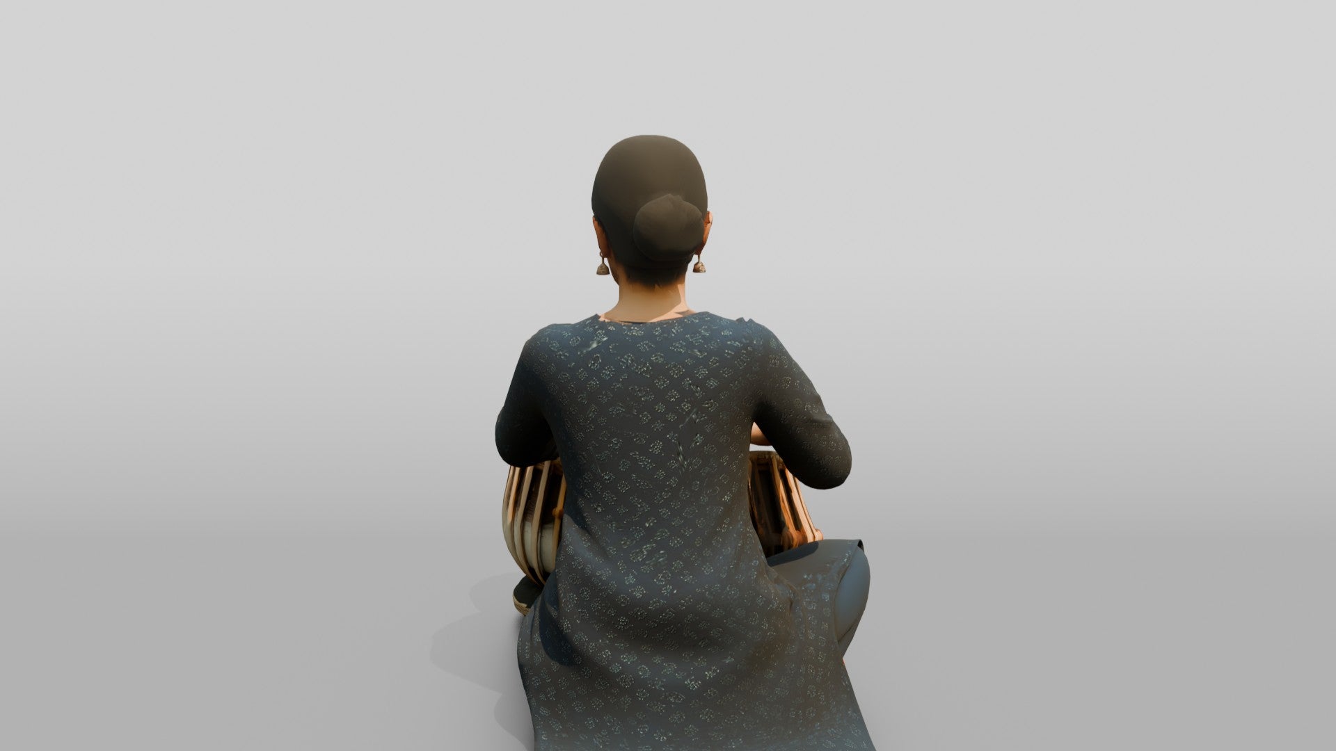 Tabla Player Seated with Twin Drums