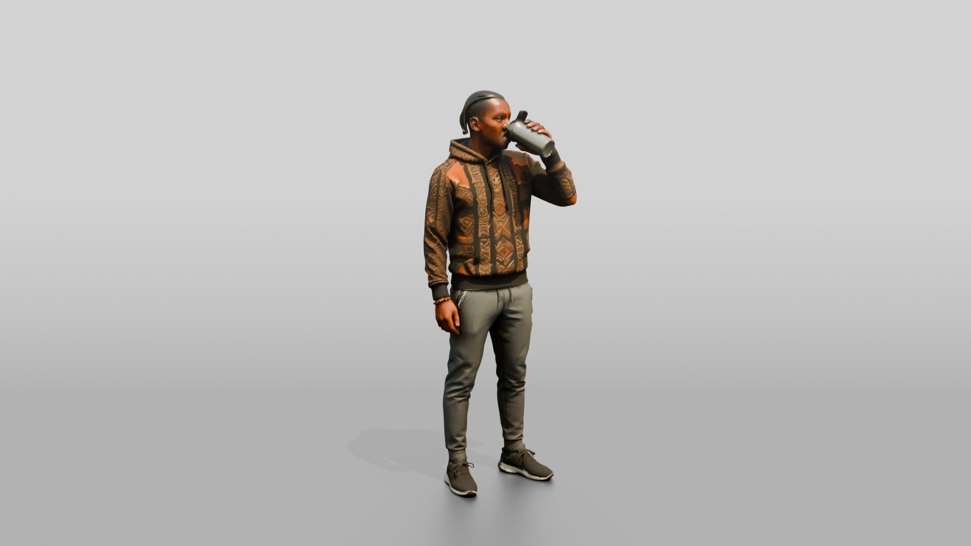 Athletic African Man Drinking Coffee in a Geometric Print Hoodie
