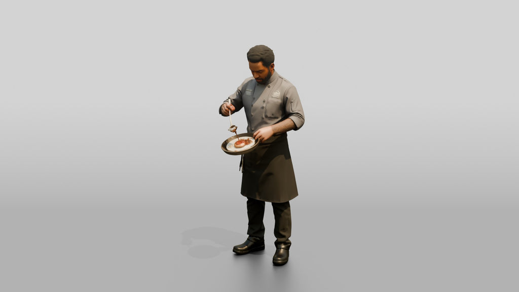 Sous Chef Saucing a Duck Breast