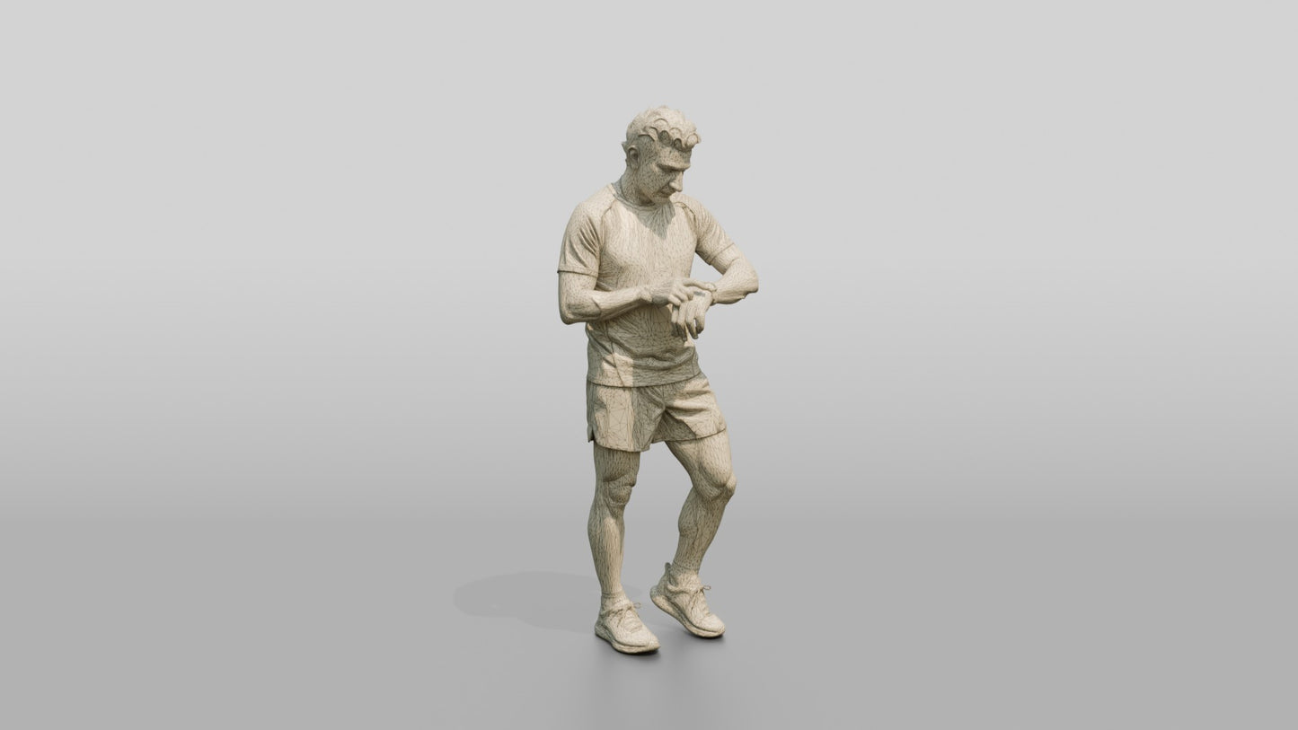Middle-Aged Athletic Greek Man Checking His Fitness Tracker