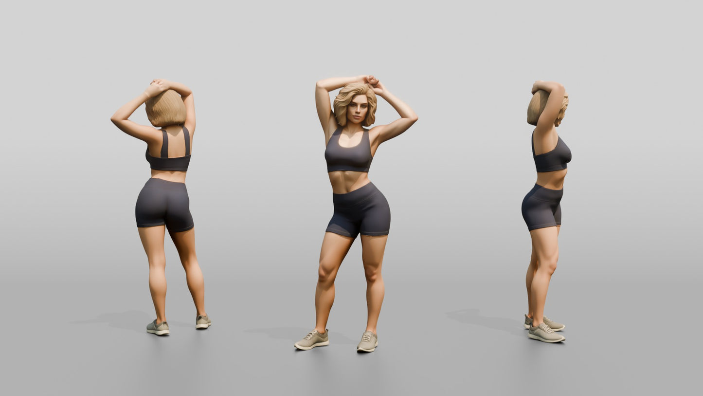 Blonde Woman in Charcoal Activewear Adjusting Her Hair