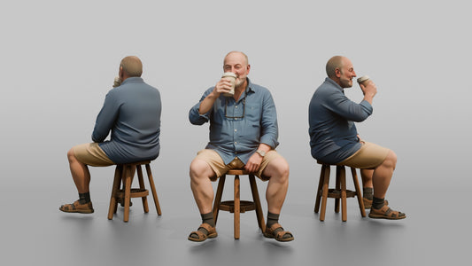 British Man Sitting with a Takeaway Coffee