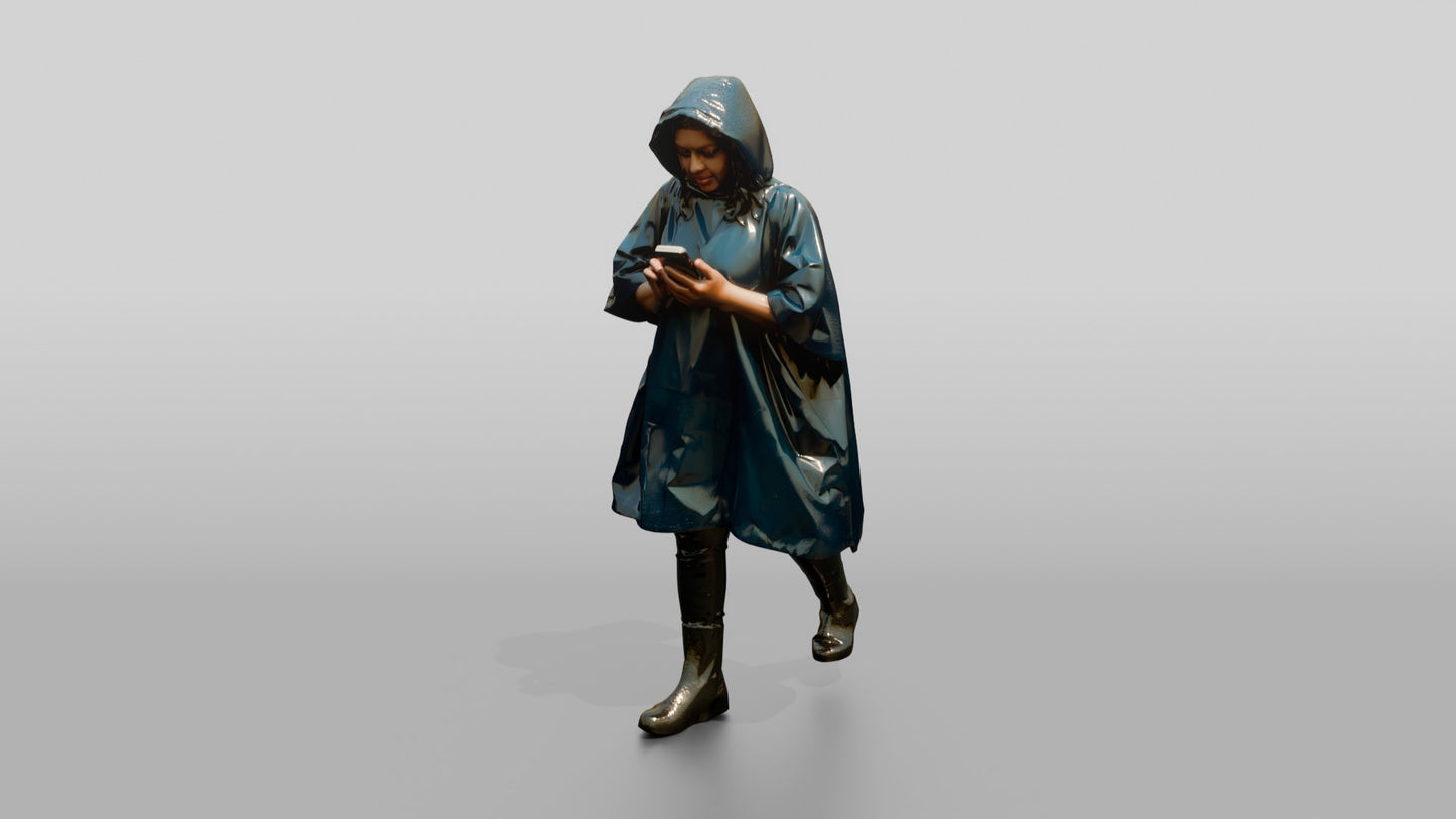 Indian Woman in Blue Poncho Checking Phone