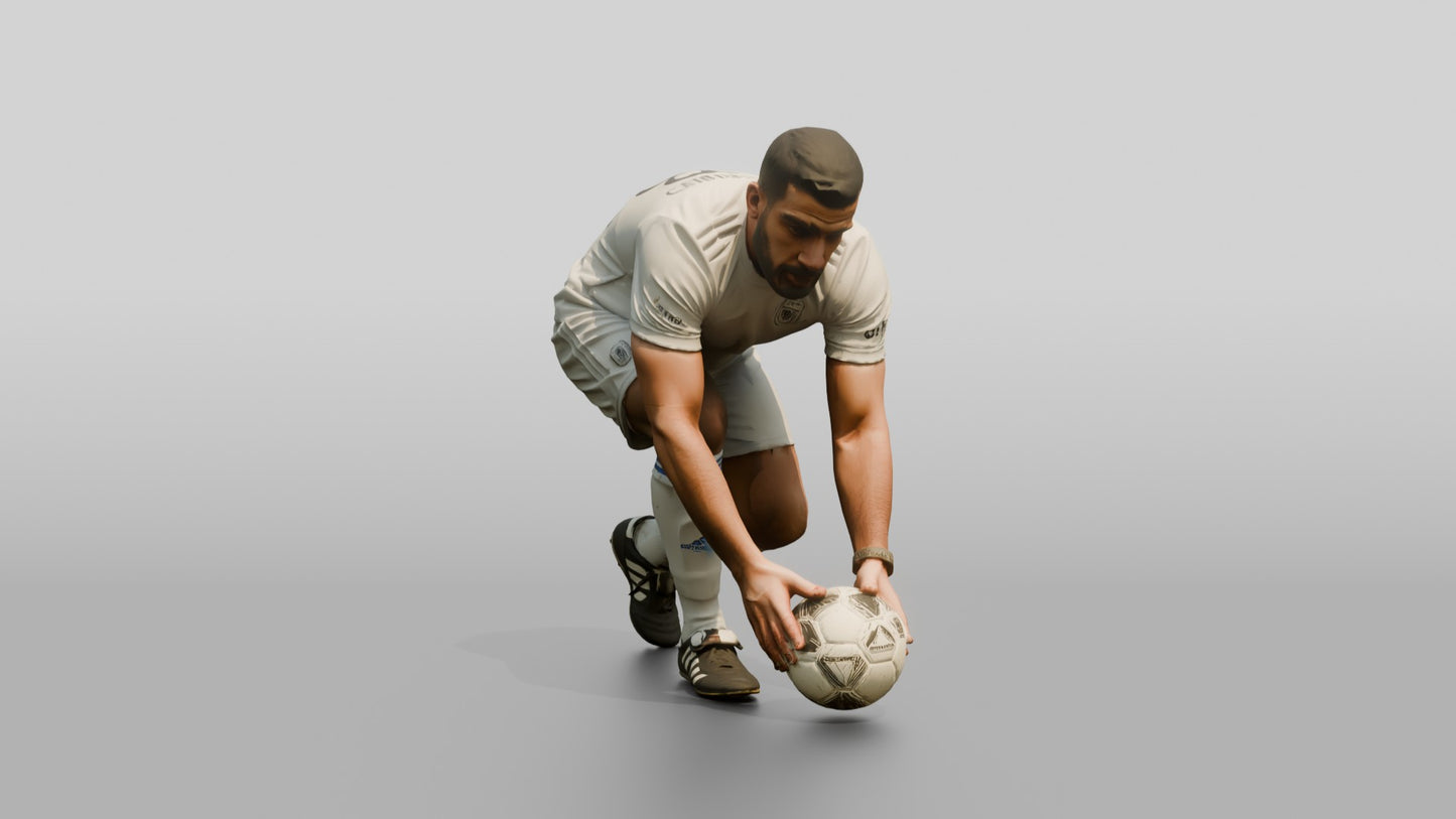 Soccer Player Placing the Ball for Penalty