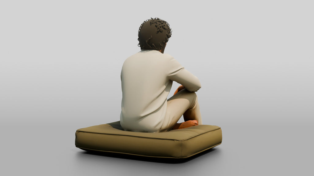 Man Sitting Cross-Legged in Linen