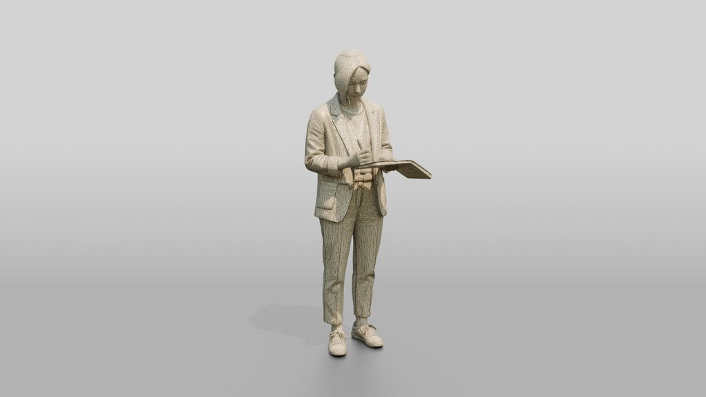 Chinese Woman in Blazer Writing in Notebook