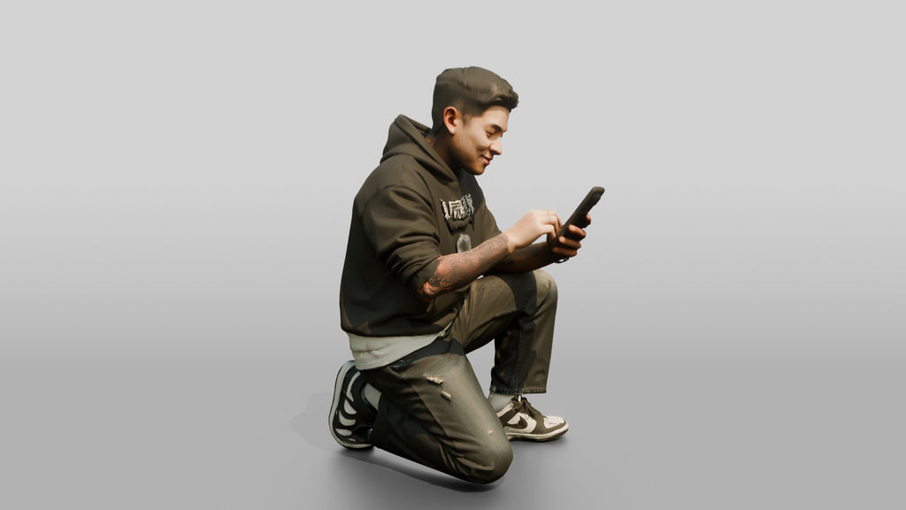 Asian Man Crouched Texting on Phone