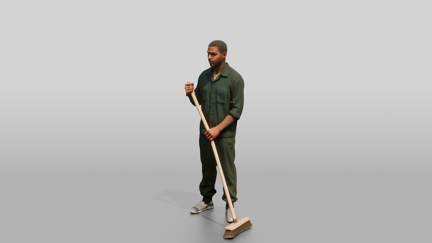 Black Male Prisoner in a Dark Green Uniform Holding a Push-broom