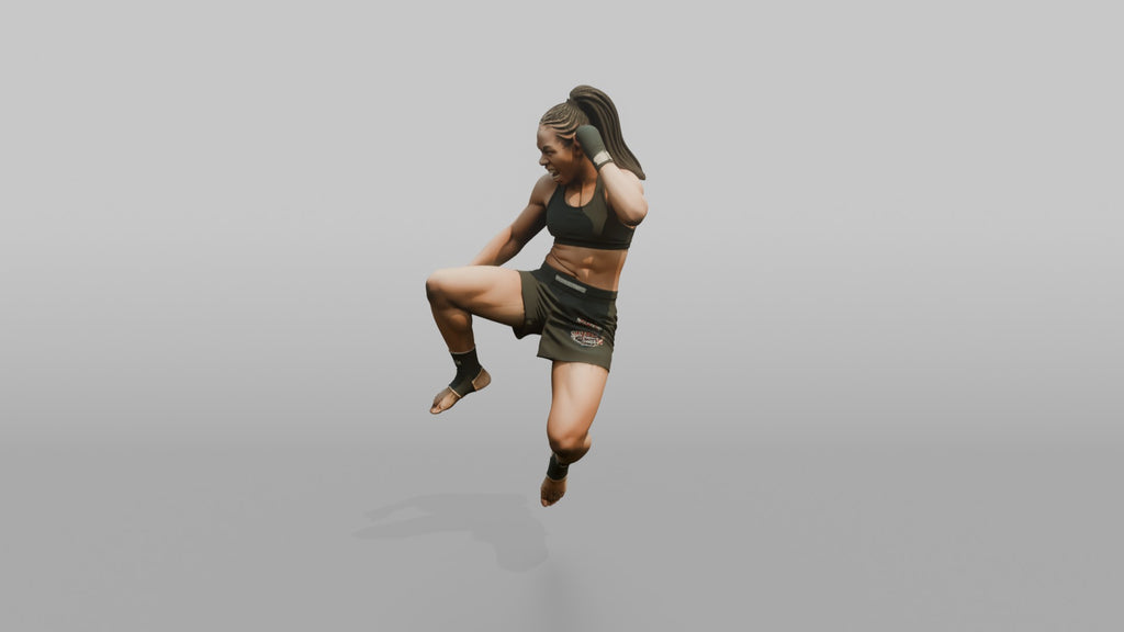 Fighter Jumping Knee Toward the Camera