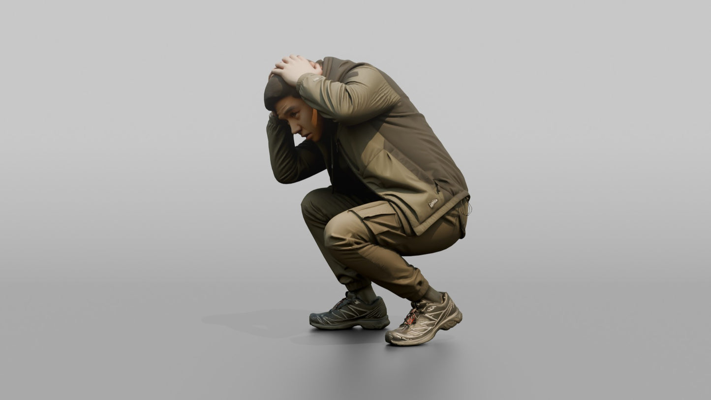 Protester Man Crouching with Hands on His Head