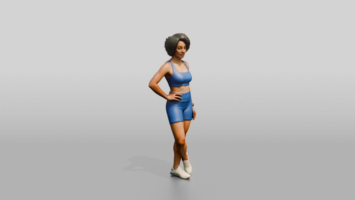 Black Woman in Blue Activewear with Hands on Hips