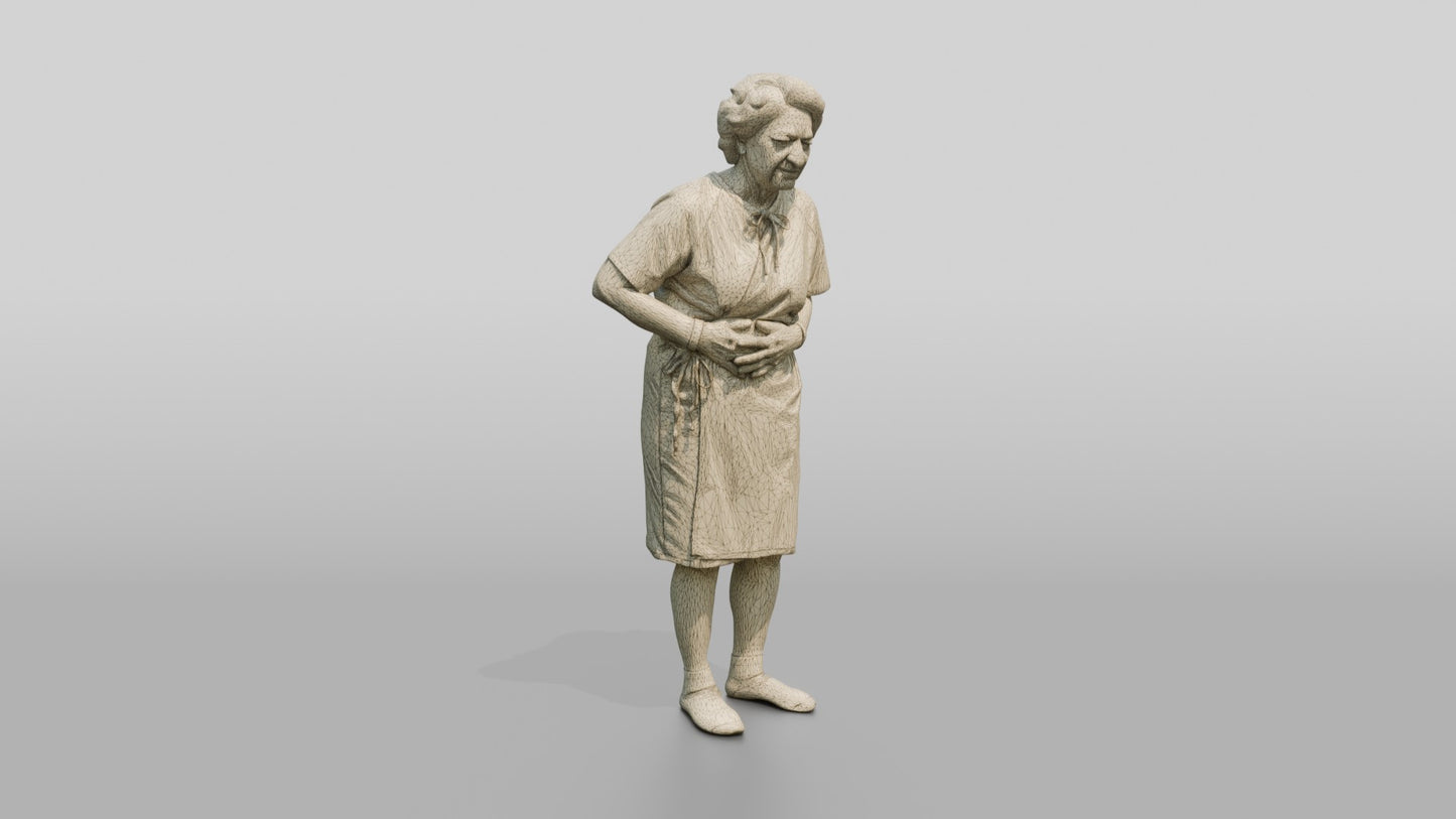 Elderly Woman Patient Holding Her Stomach in Pain