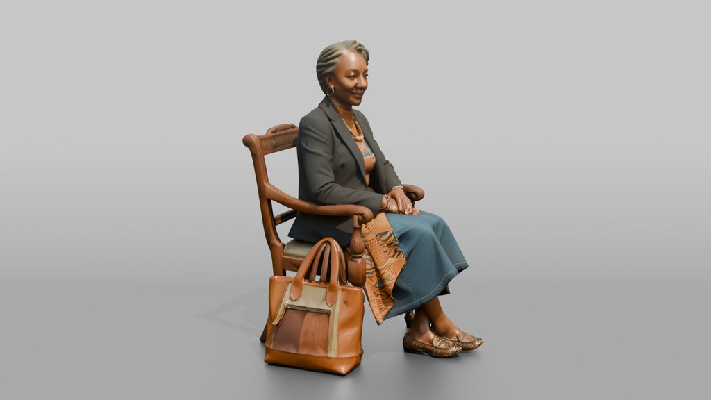 African Senior Woman Seated with Leather Tote Bag