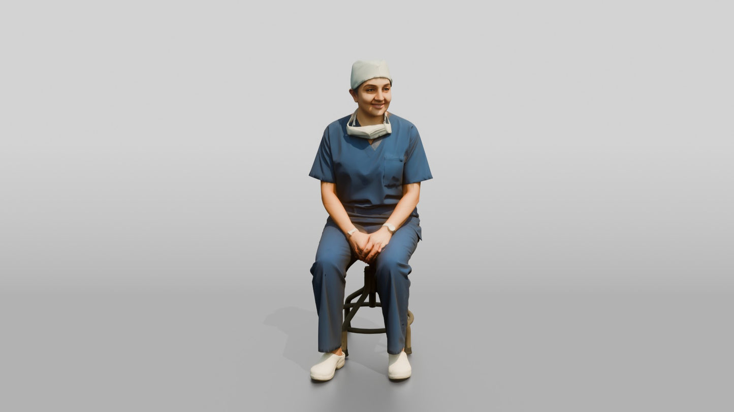 Middle-Aged South Asian Woman Doctor Sitting on Stool