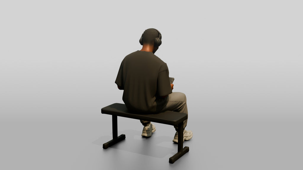 Man Sitting with Shaker and Headphones