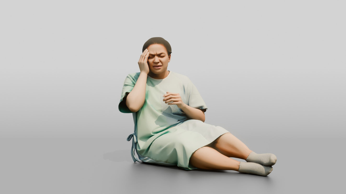 Woman Patient Sitting with a Headache