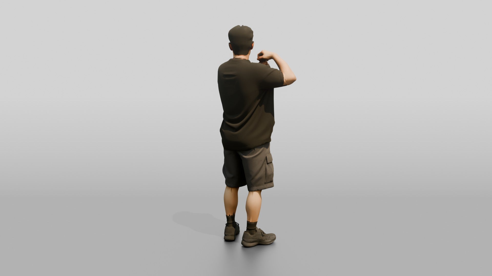 Man Adjusting Strap in Oversized Streetwear