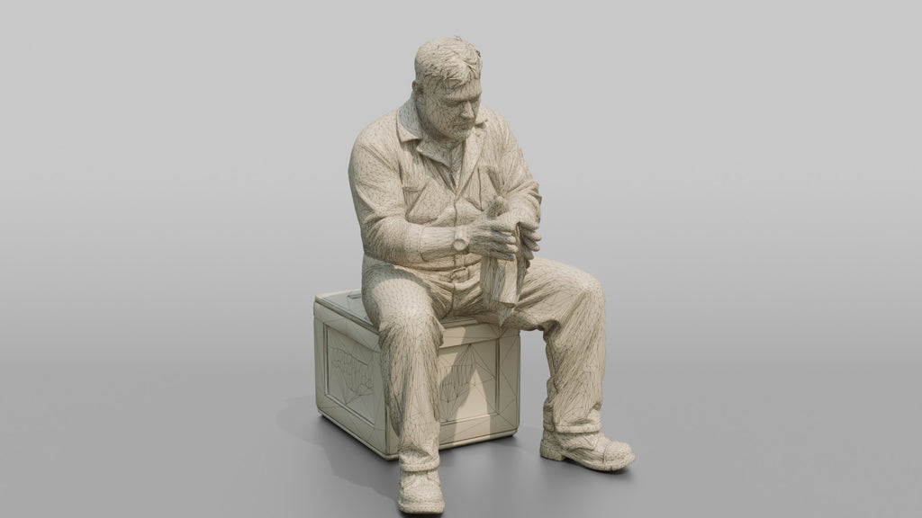 Engineer Resting on a Crate After a Long Shift