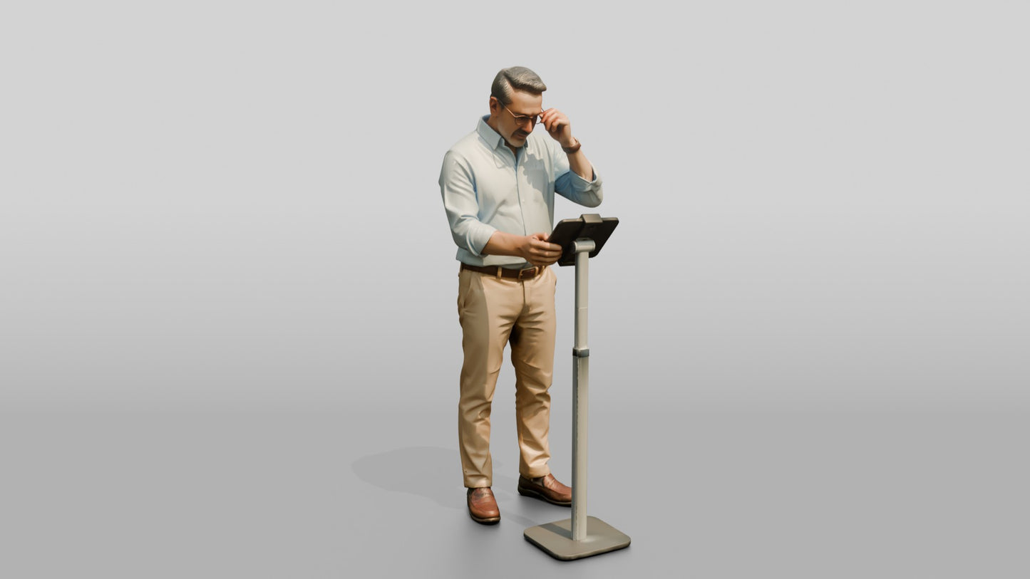 Businessman at a Standing Desk with a Tablet