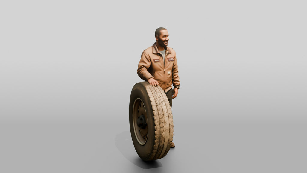 Mechanic Resting Hand on a Truck Tire