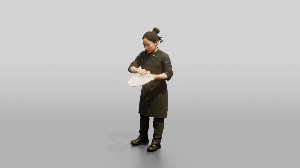 Chef Wiping a Plate Rim