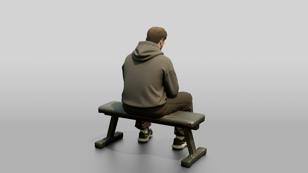 Man Sitting on Fitness Bench