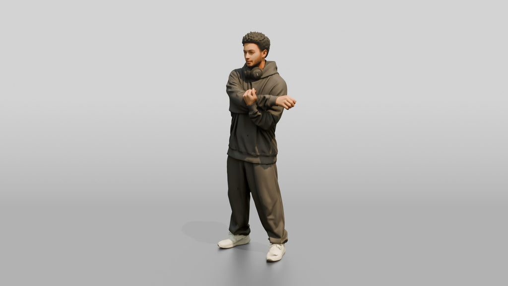 Man Stretching Arms in Oversized Hoodie