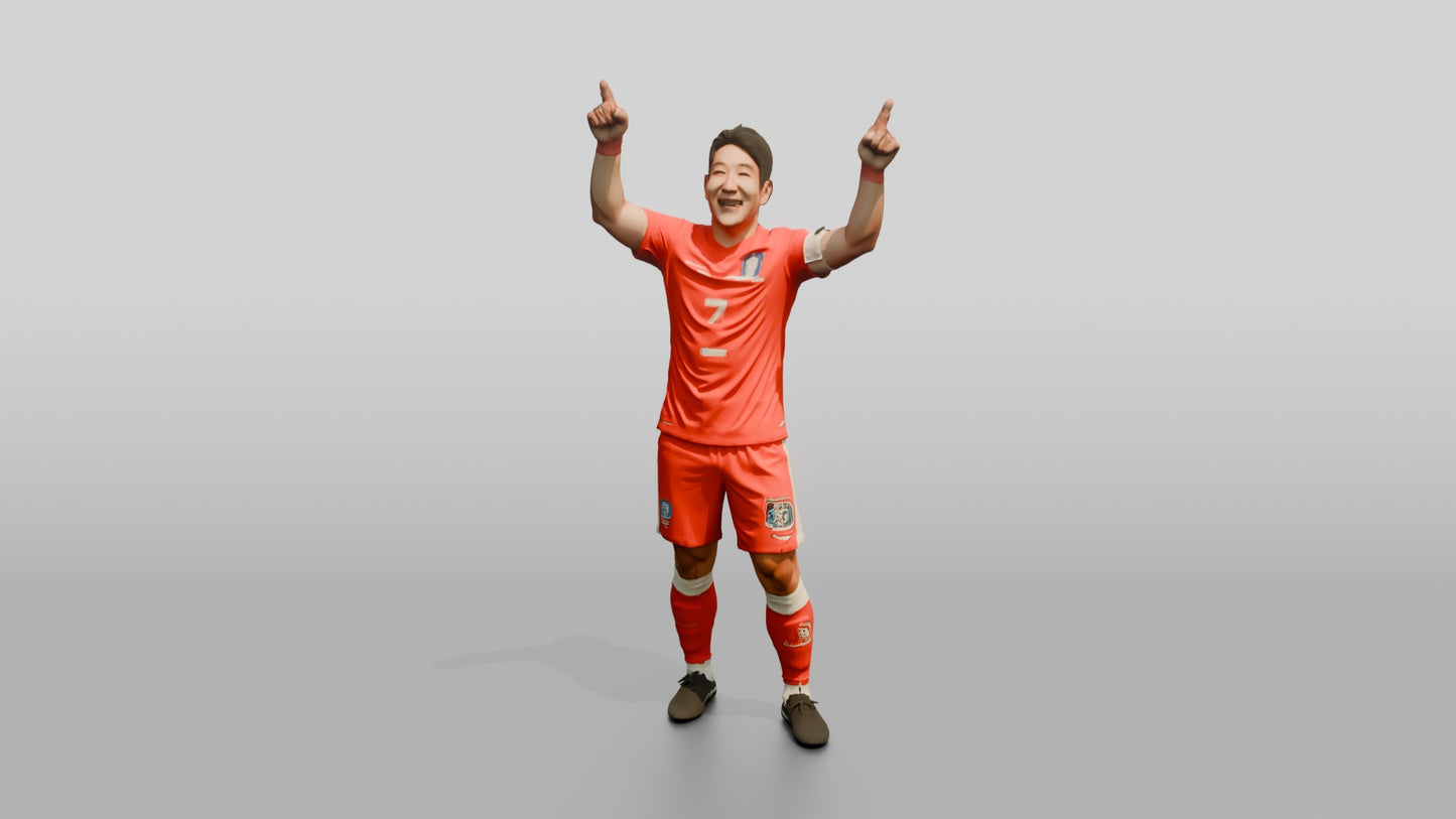 Soccer Player Pointing to the Sky