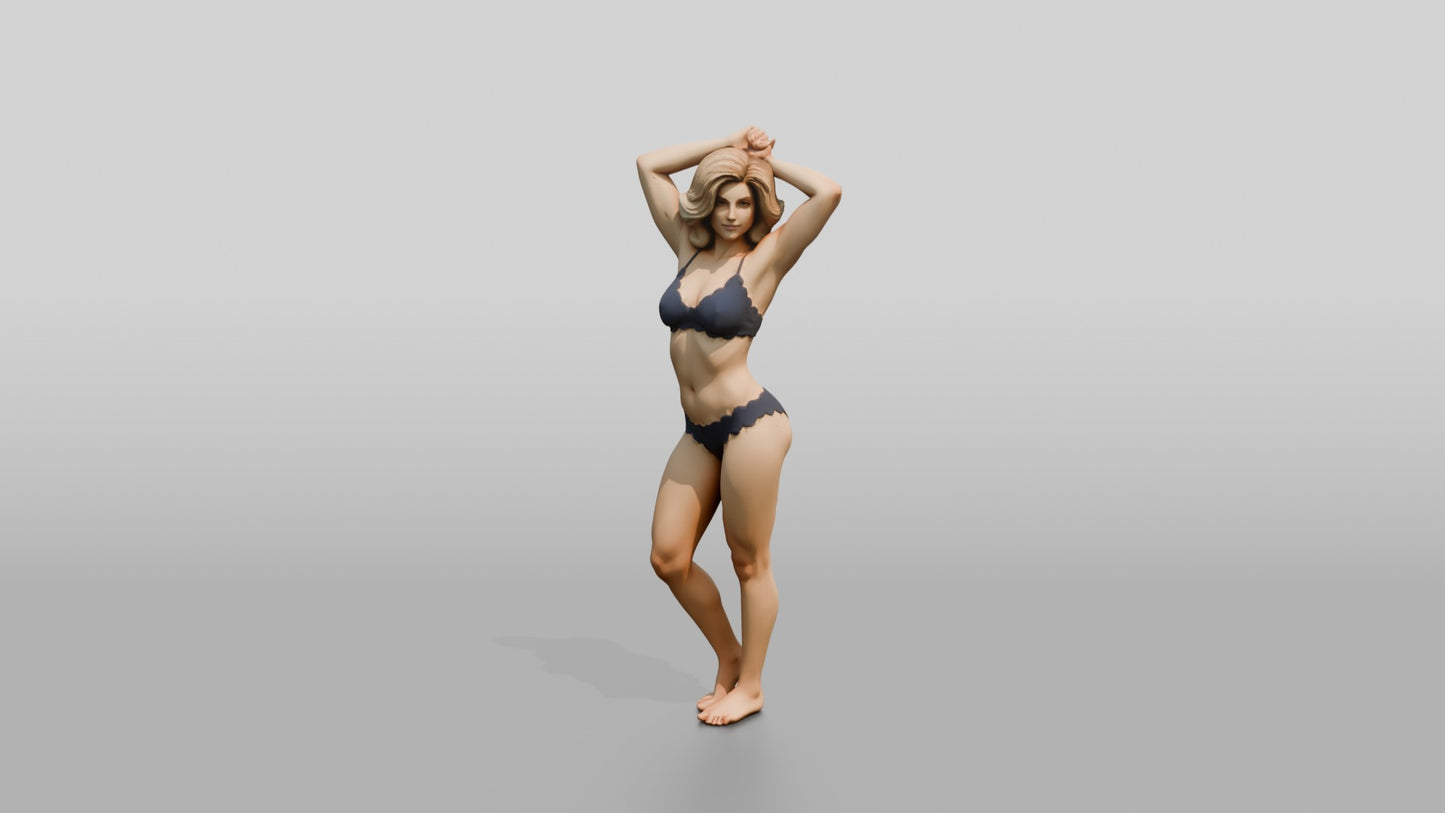 Blonde Woman in Navy Two-Piece Swimsuit Arms Raised