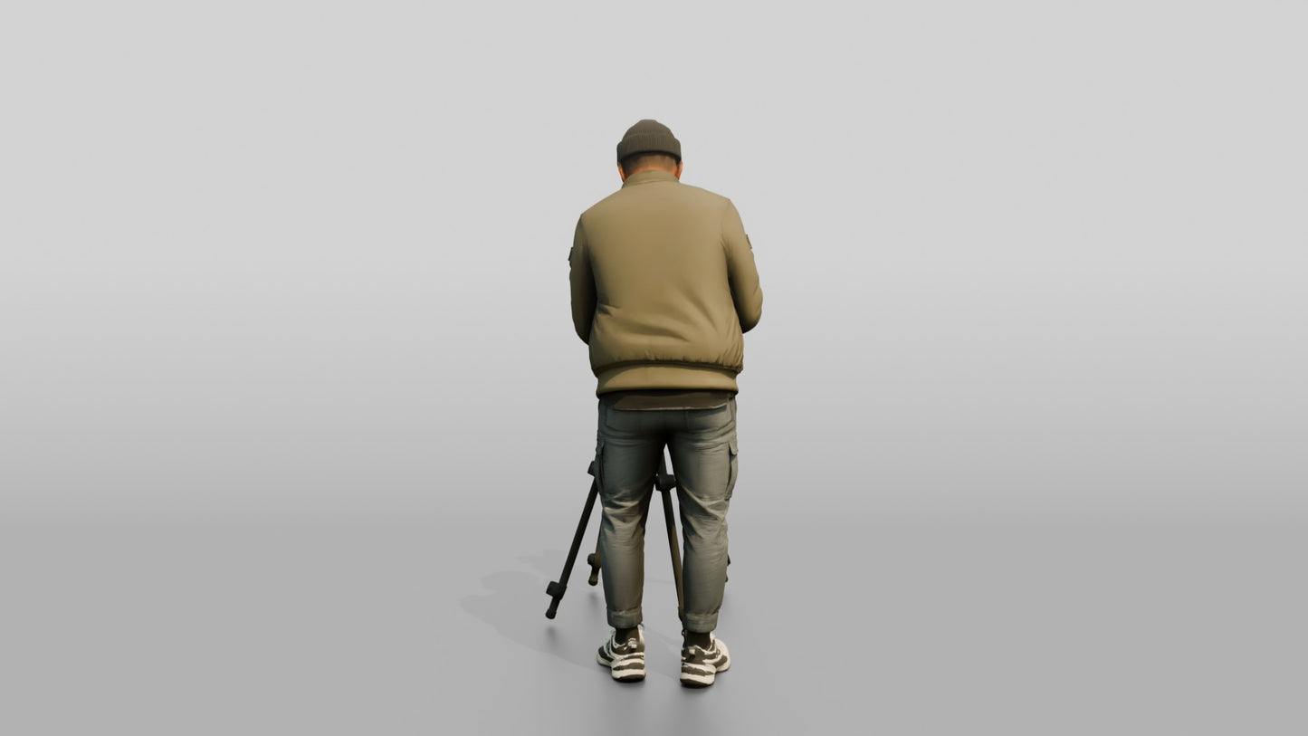 Videographer Setting Up a Camera