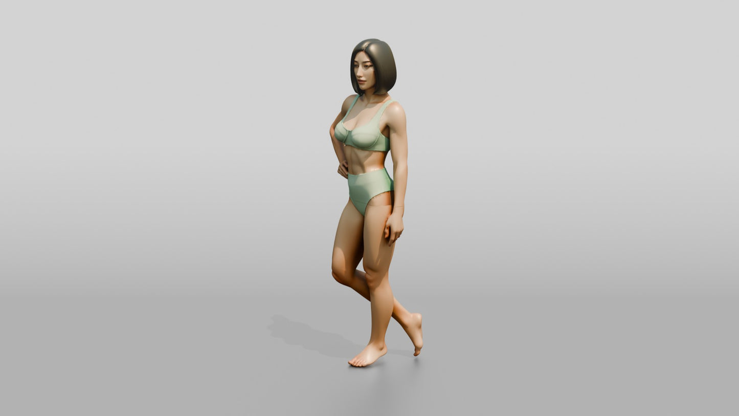 Woman in Mint Two-Piece Swimsuit with Hand on Hip