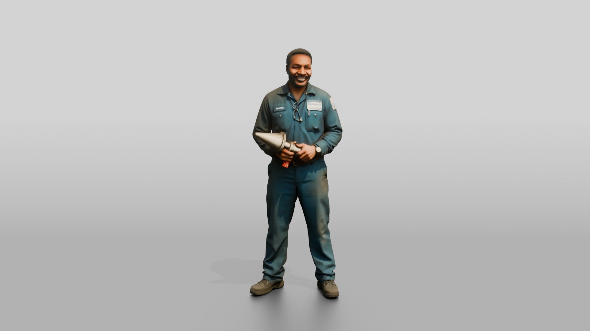 Mechanic Holding a Wheel Balancer Cone