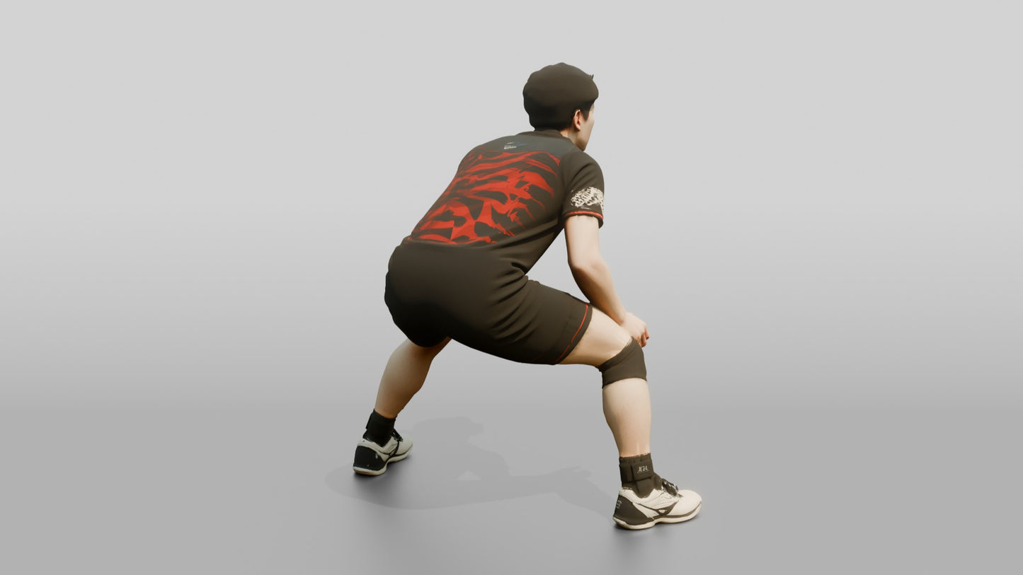 East Asian Male Volleyball Player in Black Libero Jersey