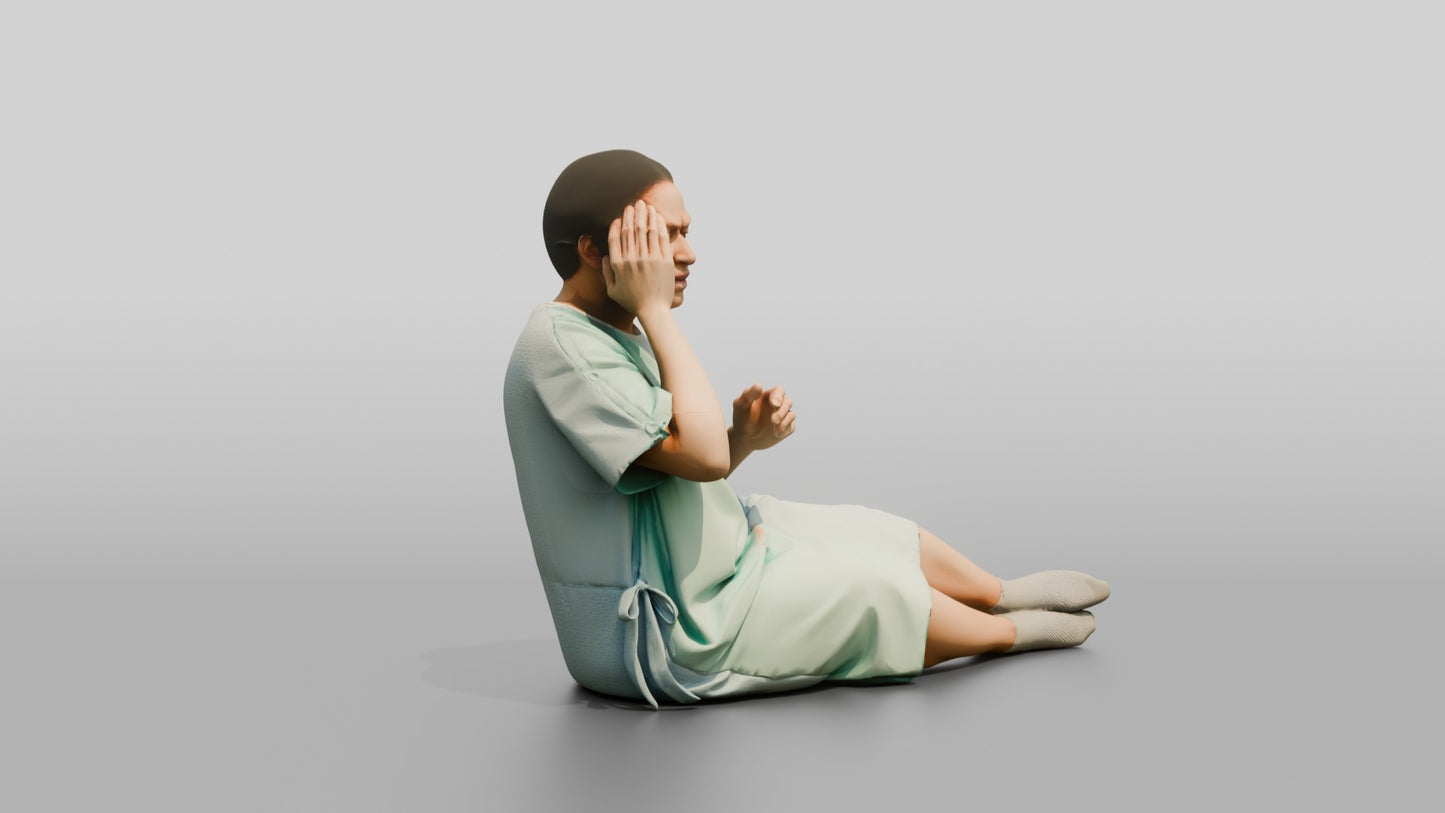 Woman Patient Sitting with a Headache