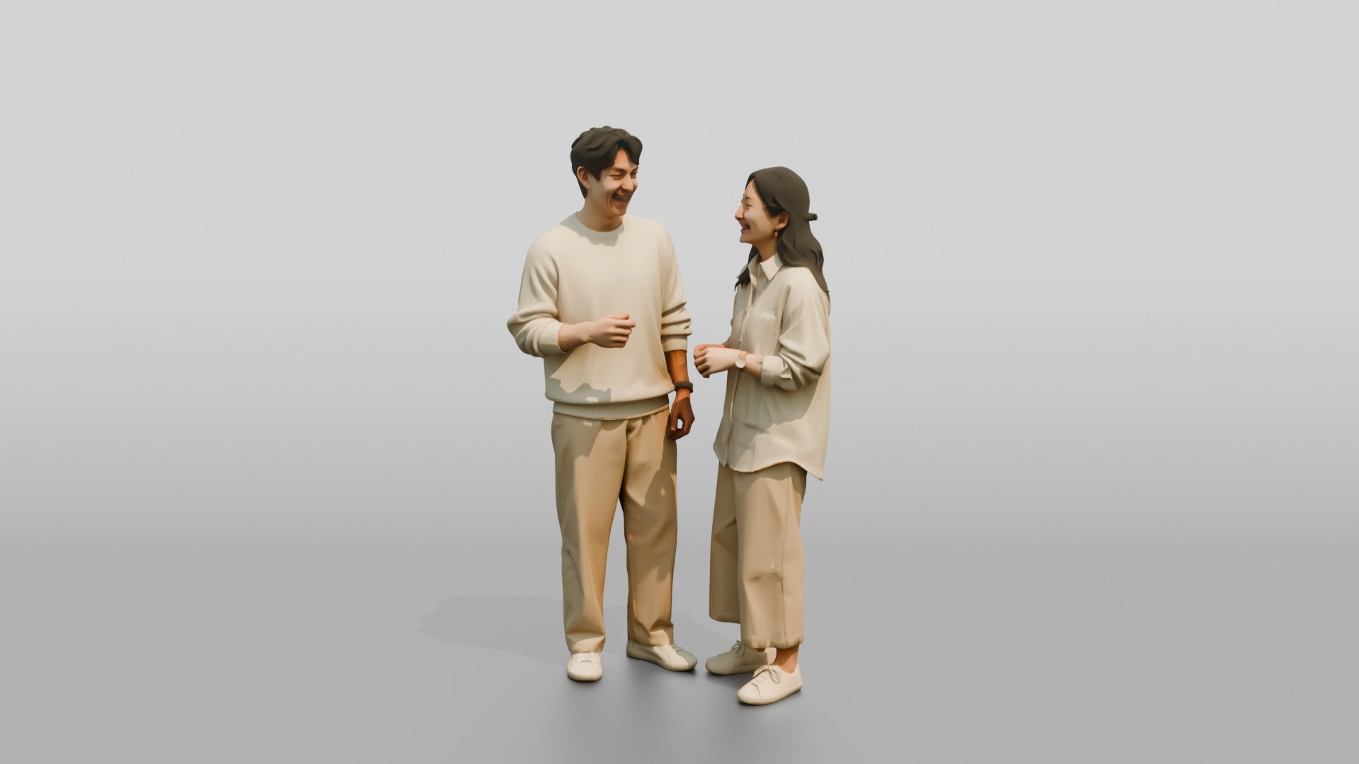 Laughing Couple in Coordinated Cream Outfits