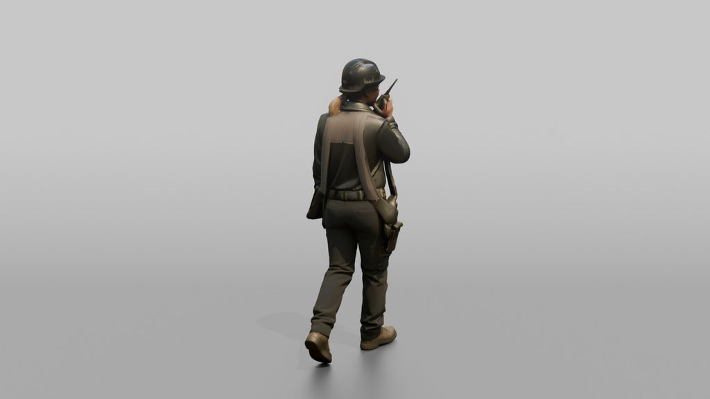 Engineer Talking on a Radio in the Machine Room