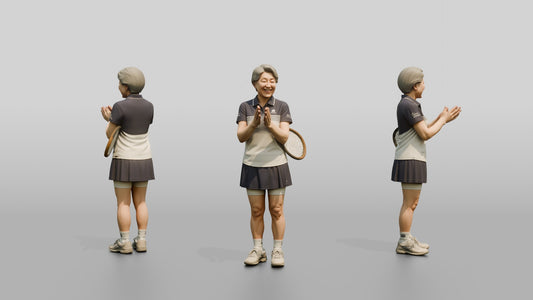 Senior Female Tennis Player Applauding a Point