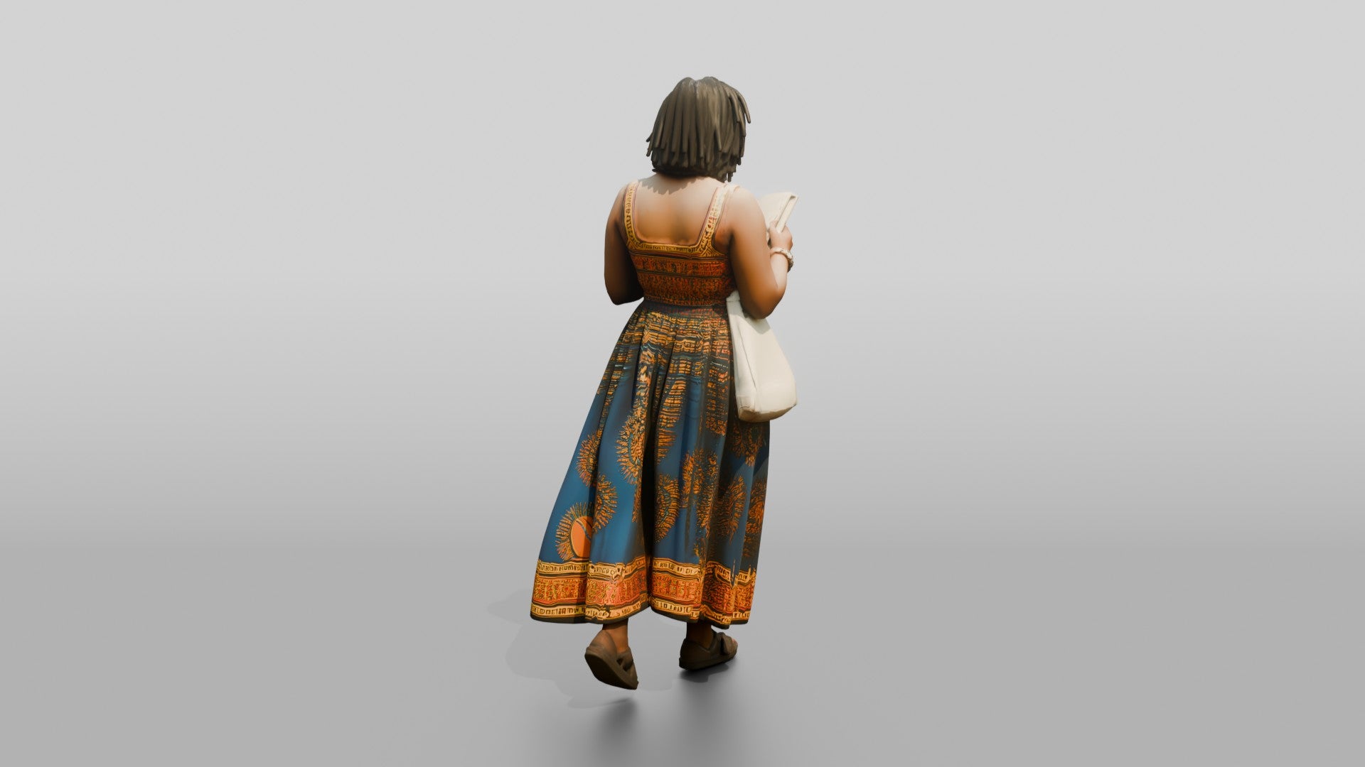 African Woman Reading a Book in a Printed Maxi Dress