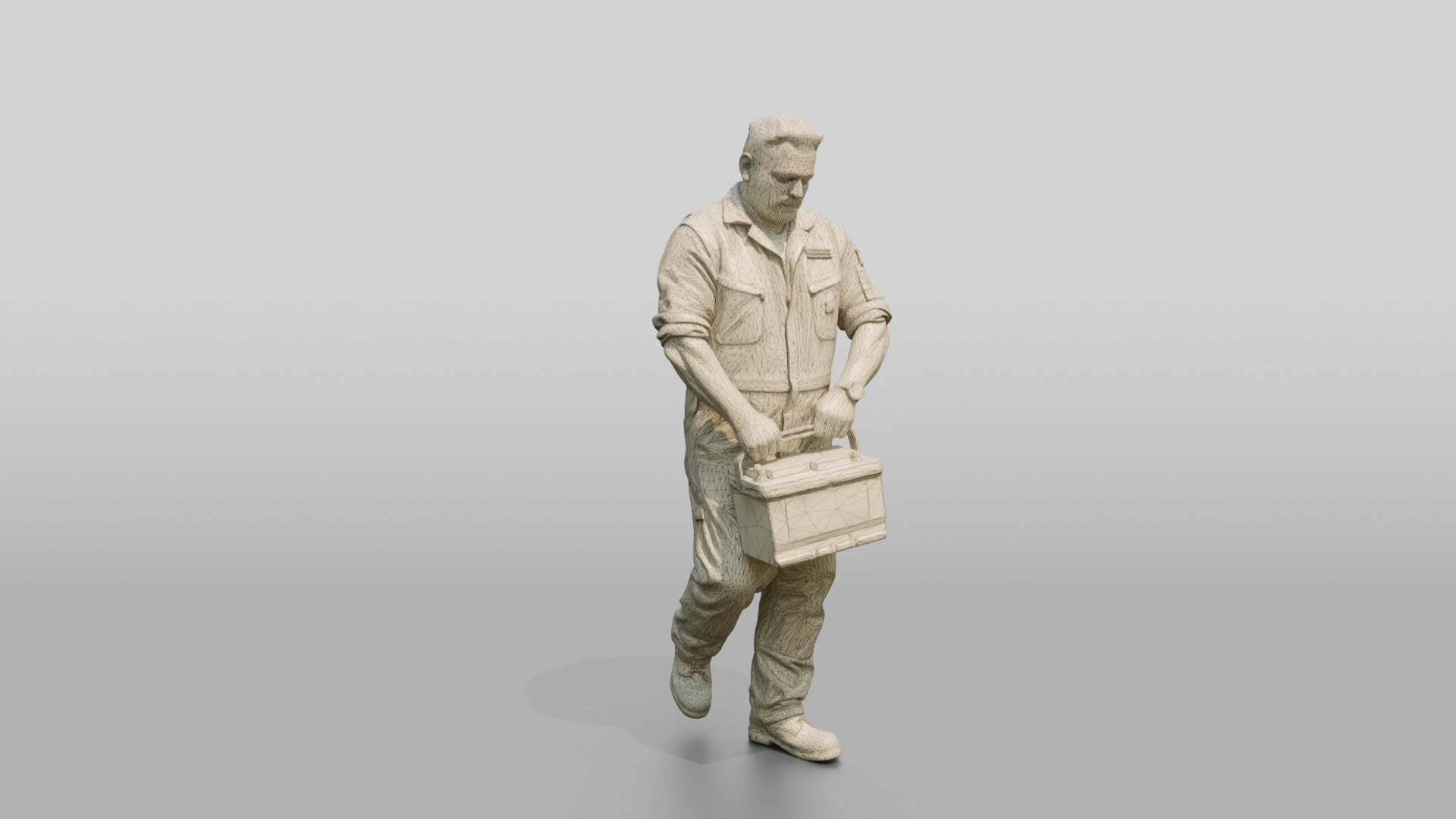 Mechanic Carrying a Car Battery