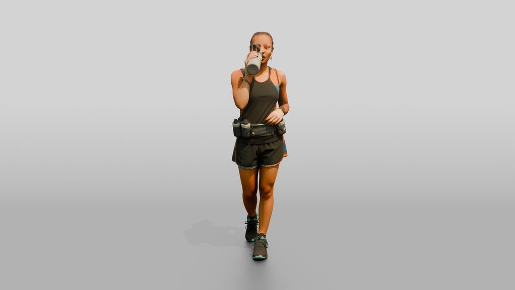 African Woman Runner Drinking Water