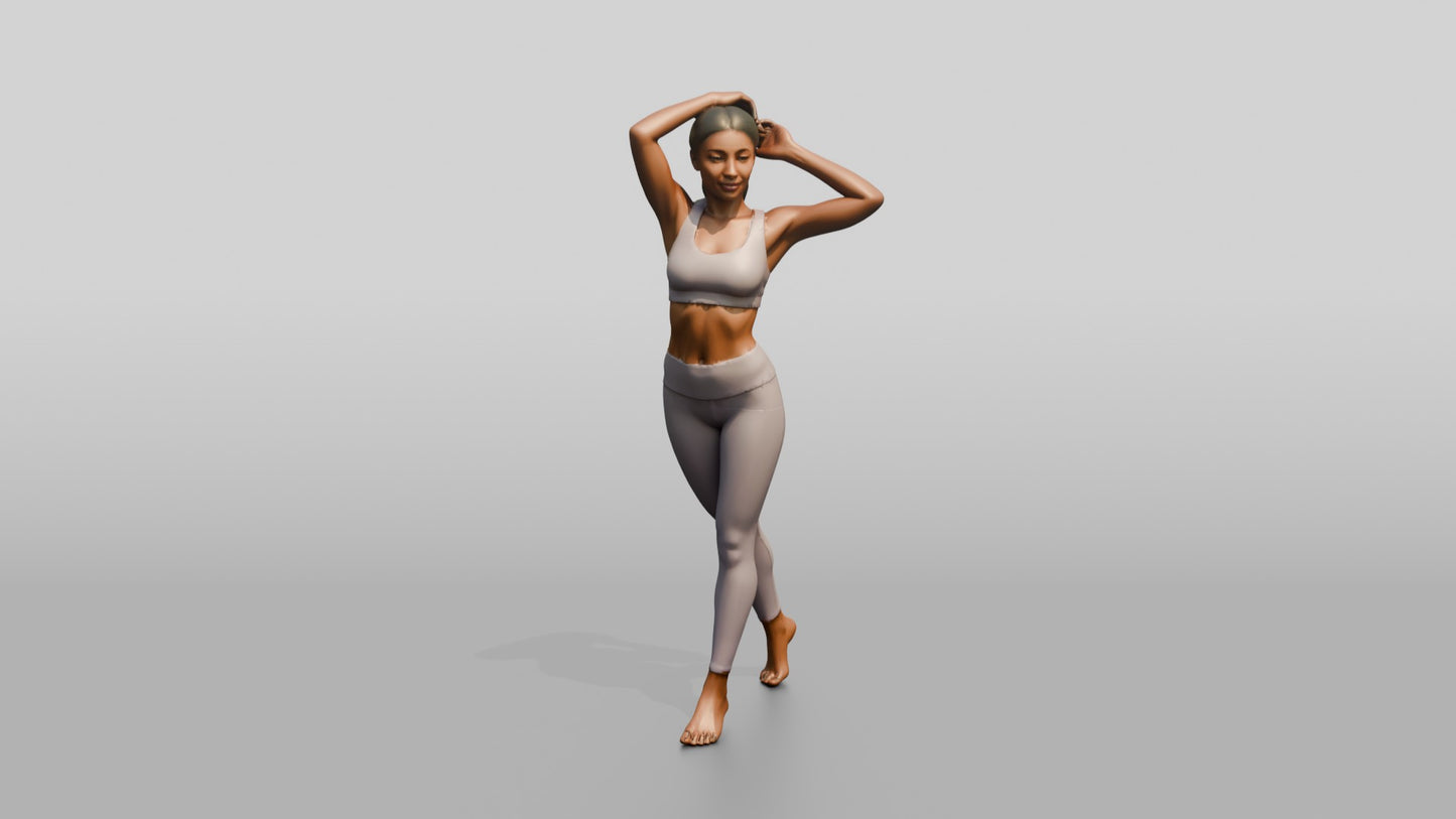 Woman in Lilac Activewear with Arms Raised to Her Hair