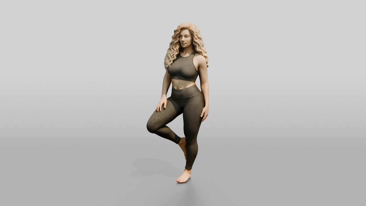 Blonde Woman in Charcoal Activewear in Tree Pose