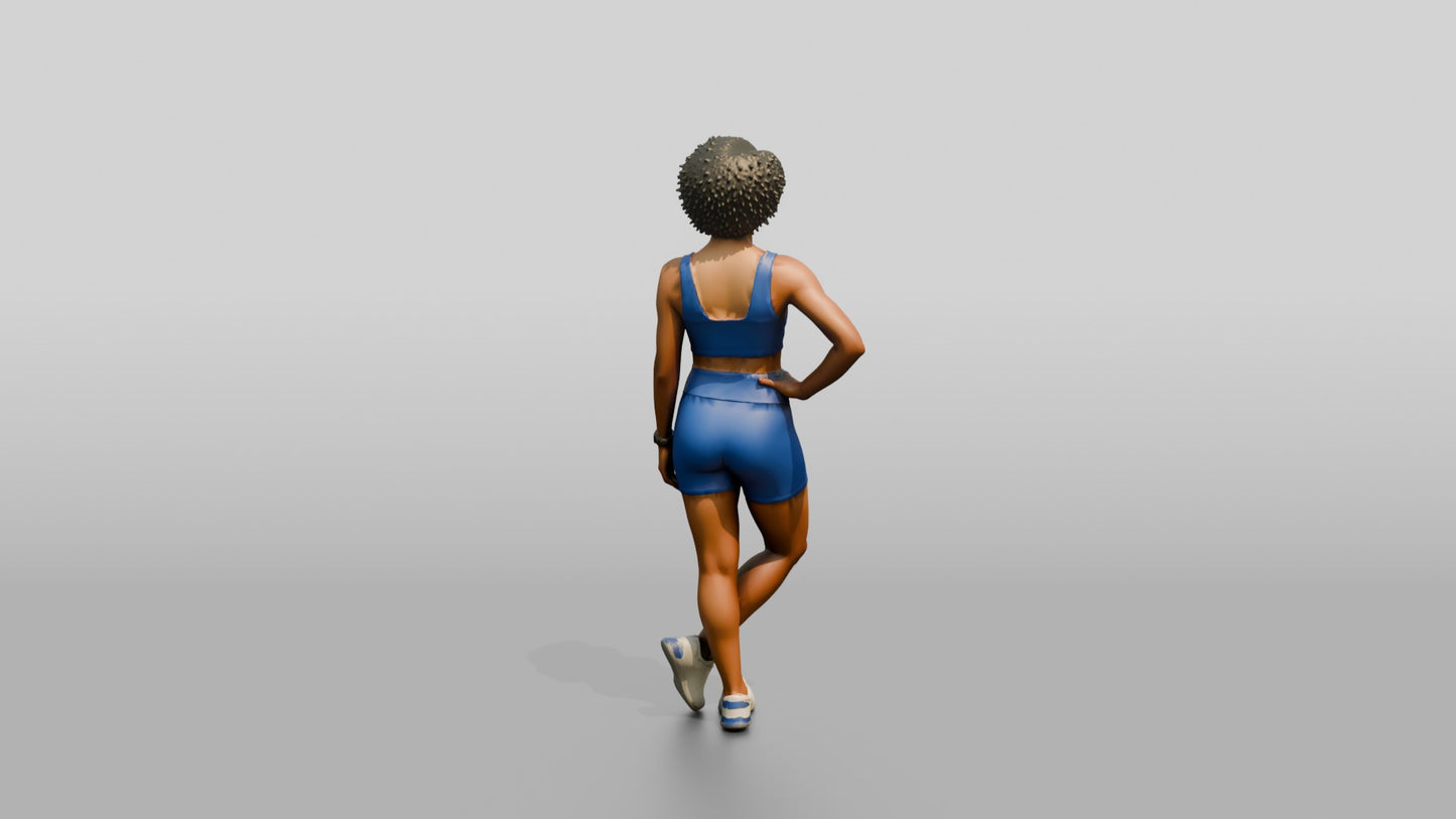 Black Woman in Blue Activewear with Hands on Hips