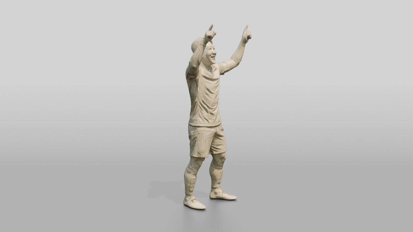 Soccer Player Pointing to the Sky