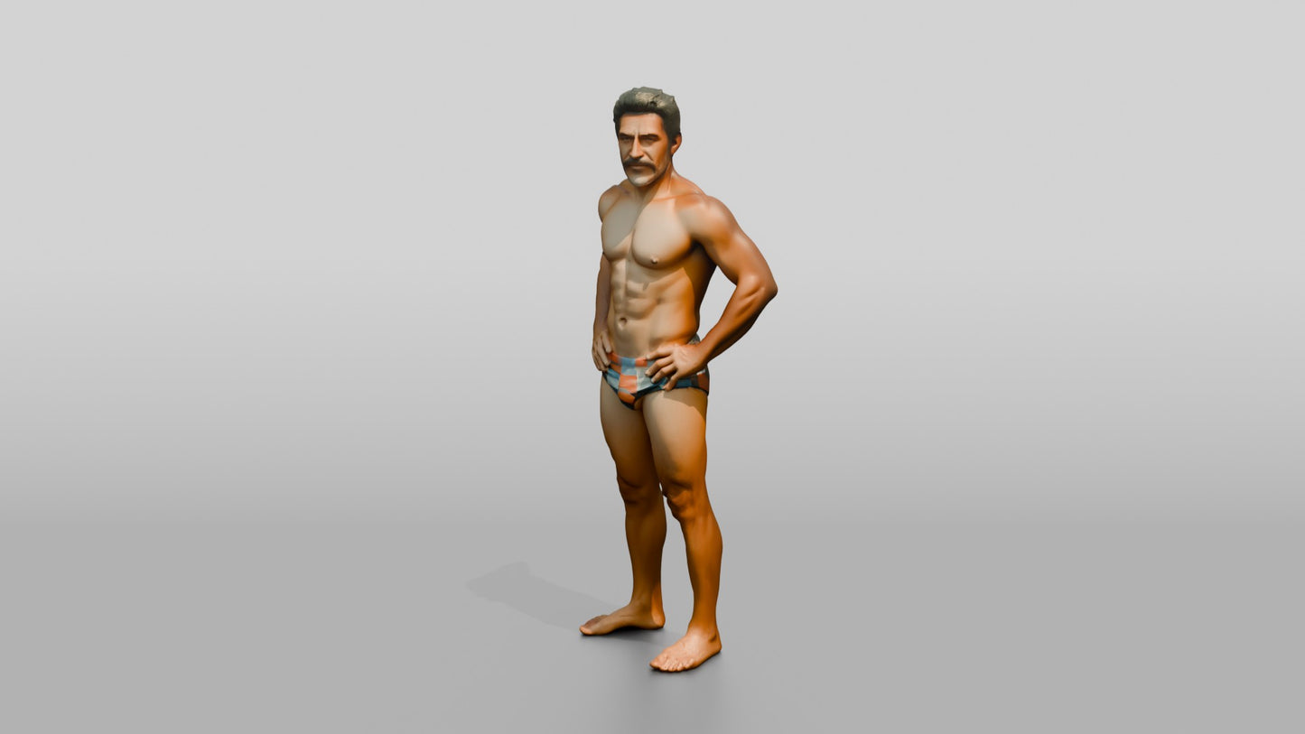 Mestizo Man Standing in Bold Patterned Swim Brief