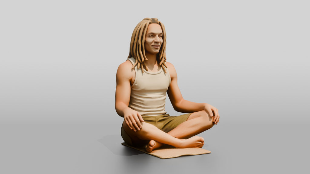 Man Meditating with Dreadlocks