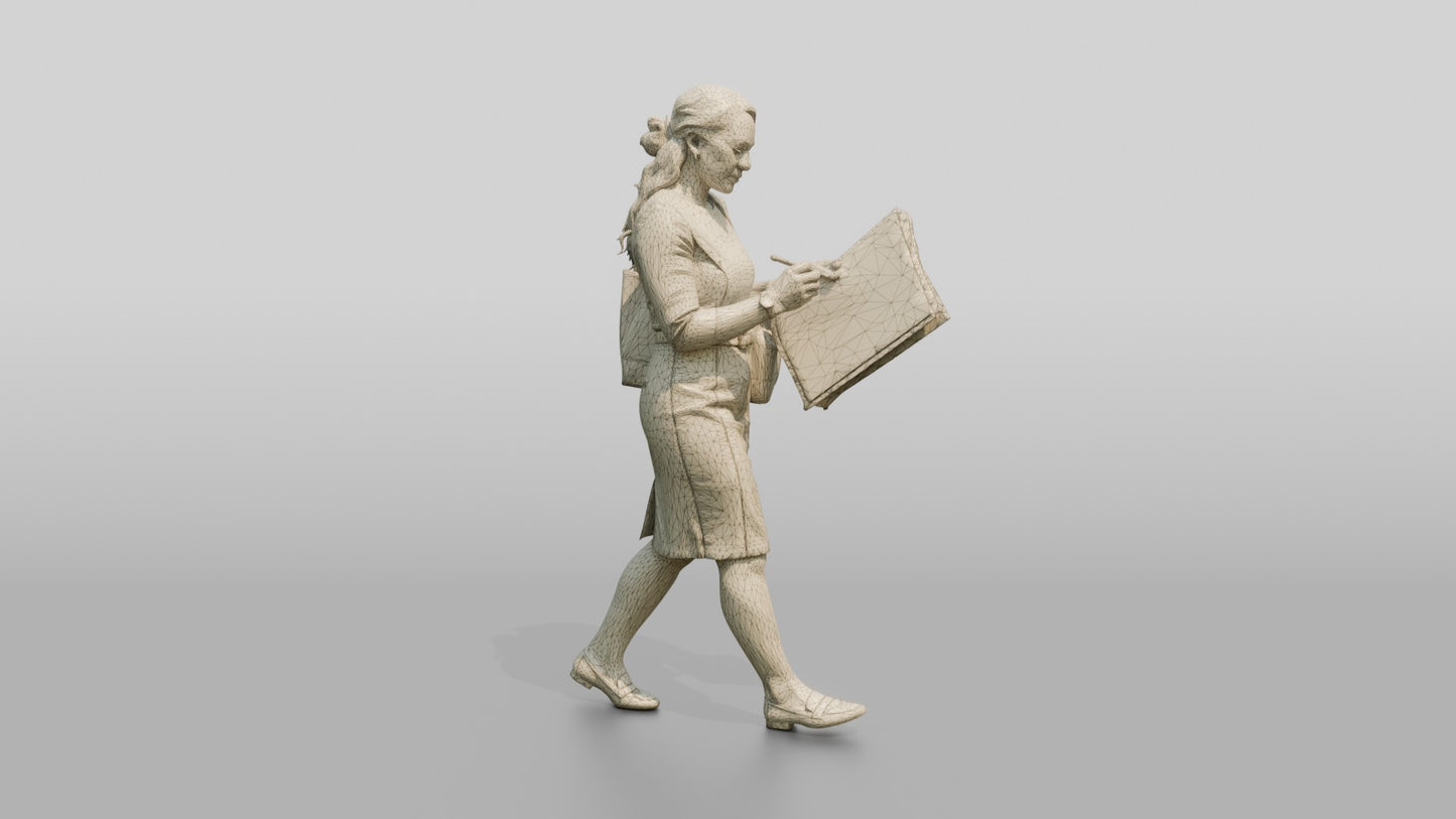 Businesswoman Walking with a Blueprint